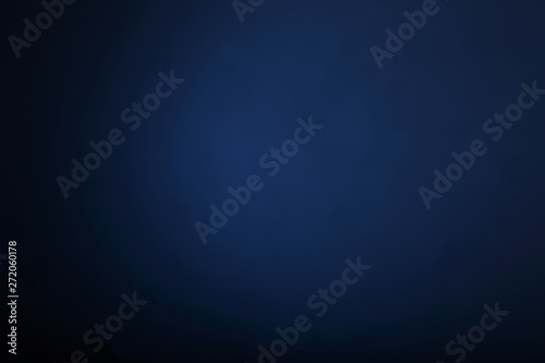 grey black blue blurred abstract background-the wall of the Studio is illuminated by a constant light