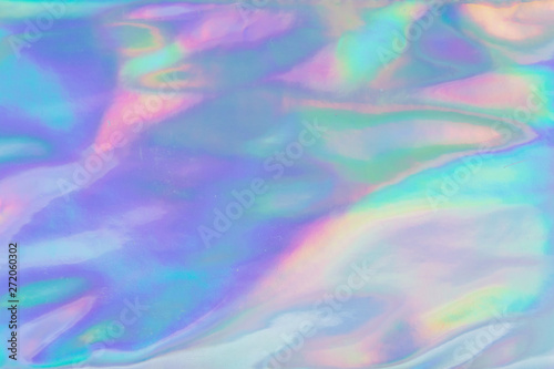 Holographic Foil Texture.  Abstract soft pastel iridescent background.  Rainbow colors photo