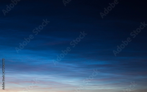 Fototapeta Naklejka Na Ścianę i Meble -  Noctilucent clouds on sunset.