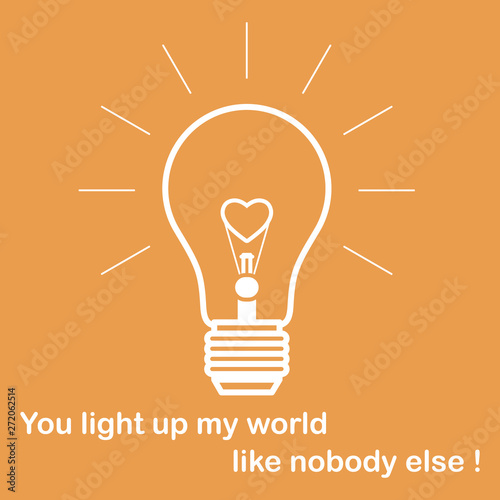 Glowing light bulb with glower in shape of heart.
