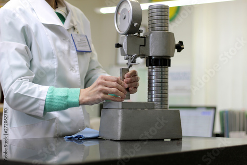 woman makes the metrological measurements