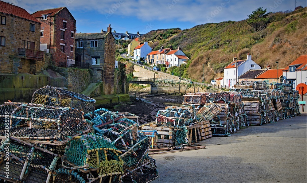 Fototapeta premium Lobster pots trail, in Staithes, near Scarborough, North Yorkshire