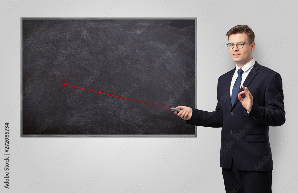 Handsome young teacher with laser pointer teaching
Handsome young teacher with laser pointer teaching
