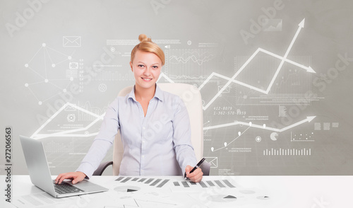 Business person sitting at desk with financial change, and report making concept 