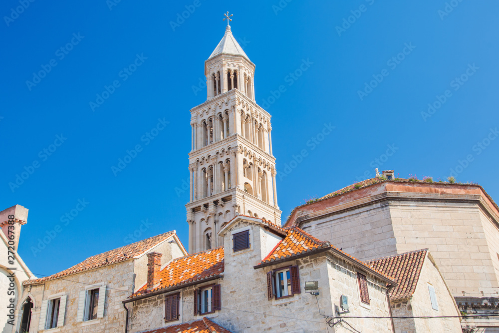 Morning in Split, Croatia, sunrise over old town houses and tower of cathedral in roman emperor Diocletian palace