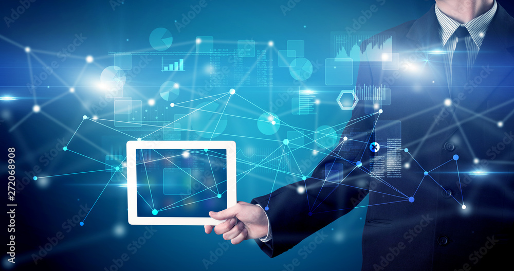 Elegant hand holding tablet with virtual database and network concept
