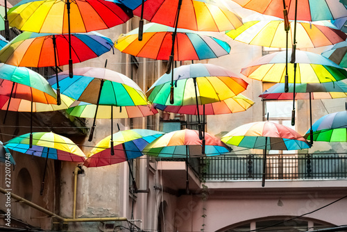 Colorful umbrellas in the sky of the Victoria Passage  in Bucharest city centre  Romania