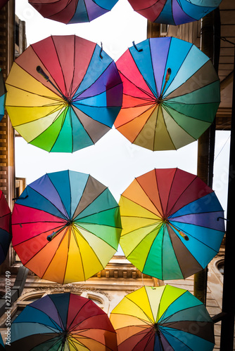 Colorful umbrellas in the sky of the Victoria Passage, in Bucharest city centre, Romania