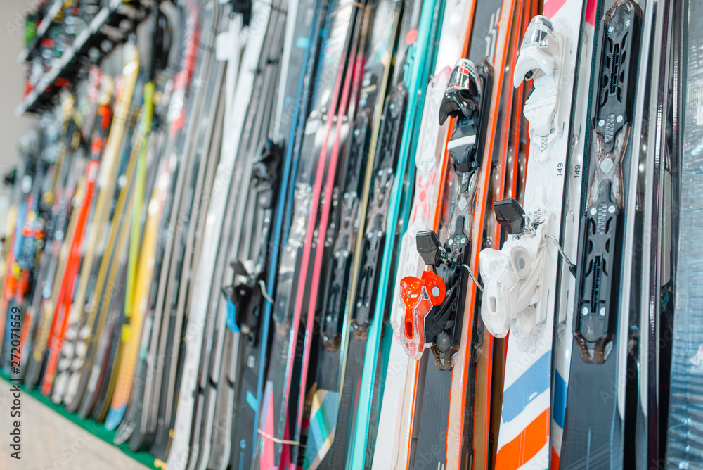 Rows of skis in sports shop, closeup, nobody Rows of skis in sports shop, closeup, nobody