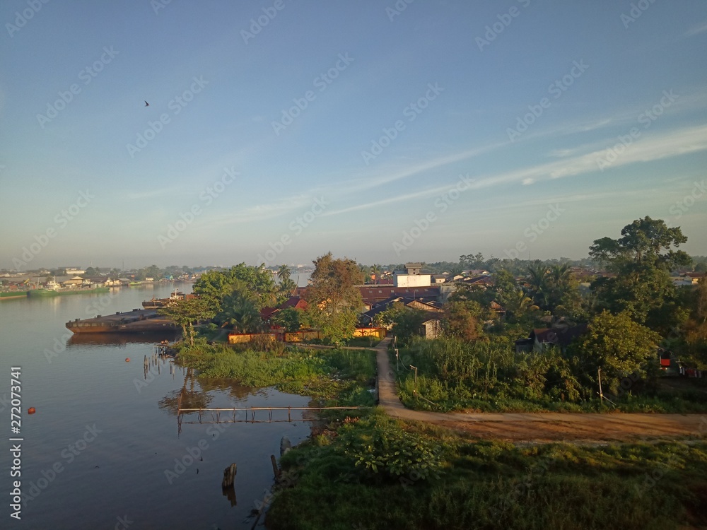 the scenery in river with the sky blue