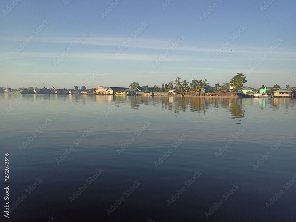 the scenery in river with the sky blue