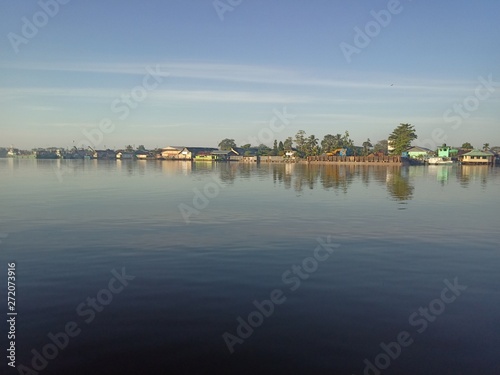 the scenery in river with the sky blue