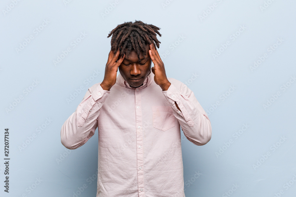 Young business african black man touching temples and having headache. Young business african black man touching temples and having headache.