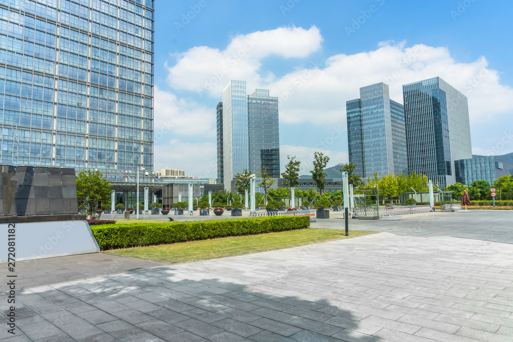 modern buildings and empty pavement in china. modern buildings and empty pavement in china.