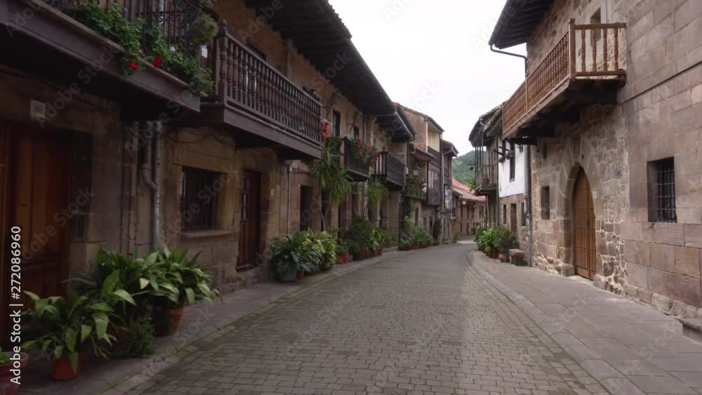 Walking in medieval village of Cartes, Cantabria, Spain . Walking in medieval village of Cartes, Cantabria, Spain .