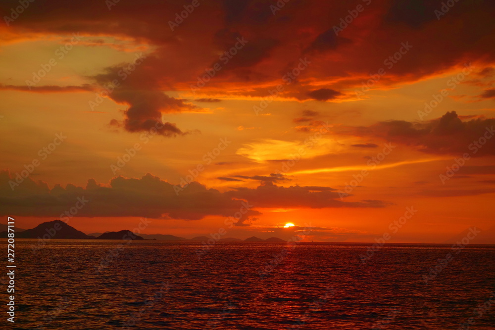 Sunset during a cruise around Komodo National Park located in Indonesia near to Labuan Bajo Sunset during a cruise around Komodo National Park located in Indonesia near to Labuan Bajo