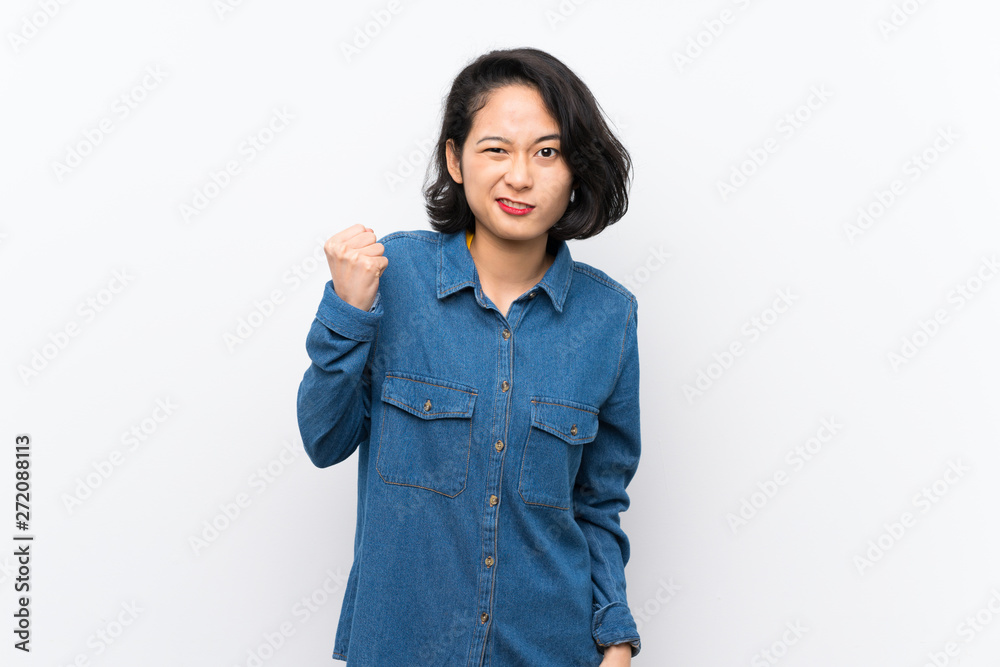 Asian young woman over isolated white background with angry gesture Asian young woman over isolated white background with angry gesture