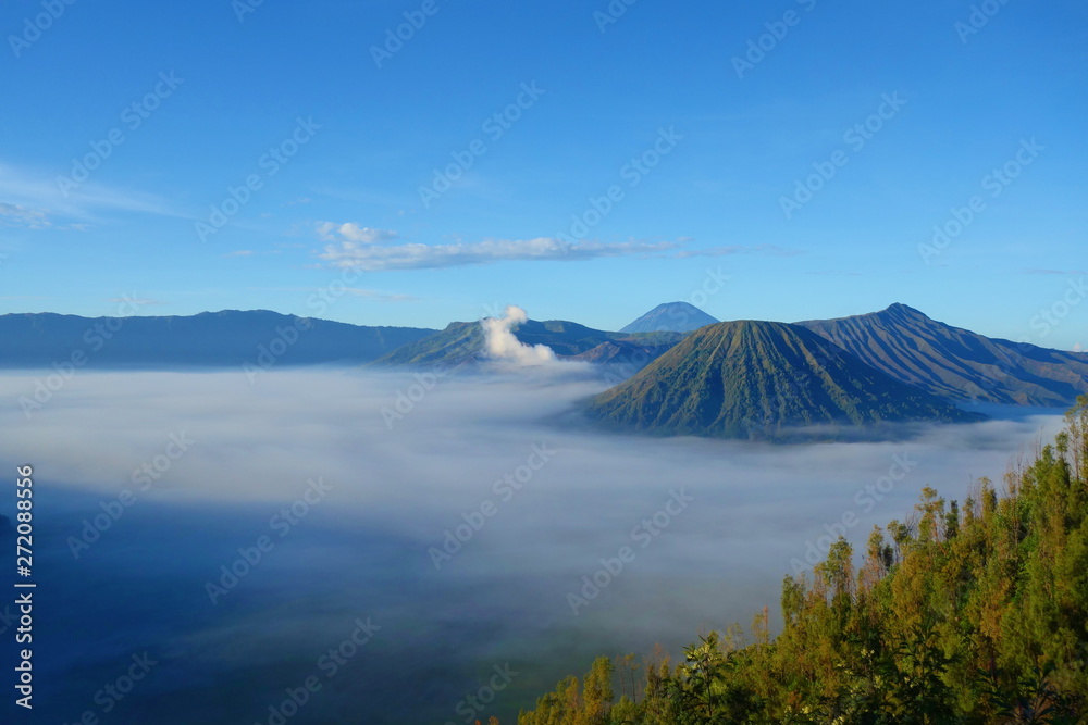 Mount Bromo volcano during sunrise, the magnificent view of Mt. Bromo located in Bromo Tengger Semeru National Park, East Java, Indonesia