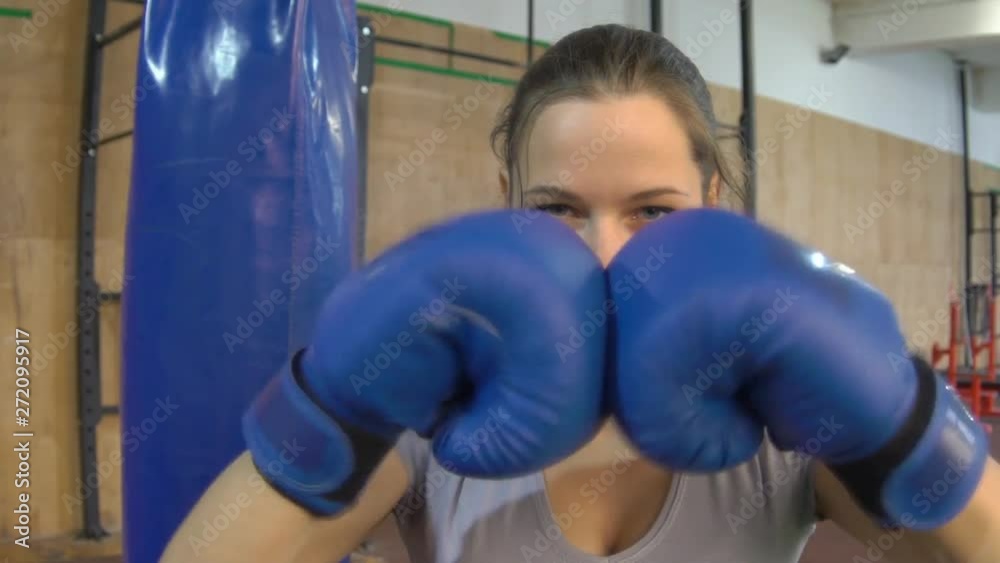 Slow Motion Sexy Girl Punching Gloves Together, Closeup Slow Motion Sexy Girl Punching Gloves Together, Closeup