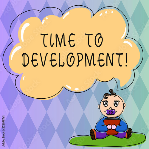 Text sign showing Time To Development. Conceptual photo length of time during which company grows improve Baby Sitting on Rug with Pacifier Book and Blank Color Cloud Speech Bubble