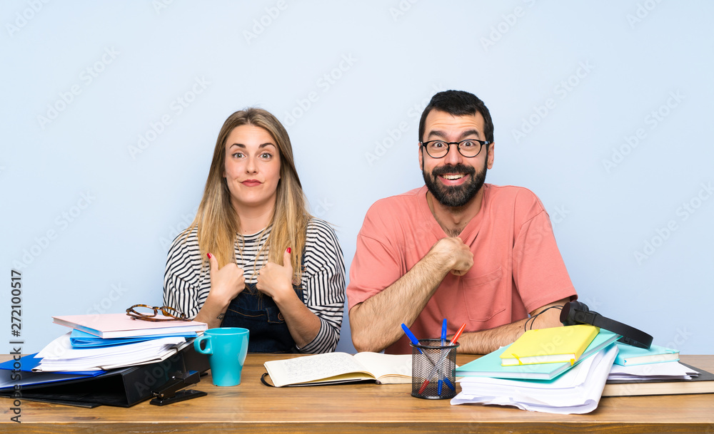 Students with many books with surprise facial expression