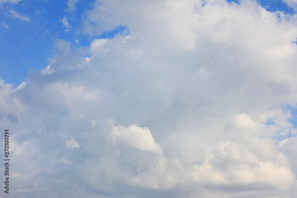 Fluffy white cloud on blue sky background