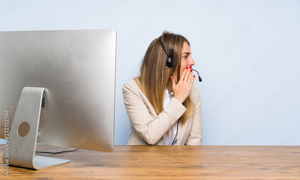 Young telemarketer woman shouting with mouth wide open Young telemarketer woman shouting with mouth wide open