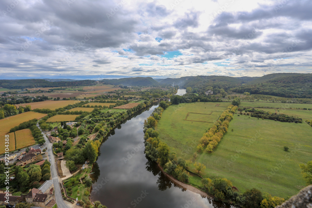 Top view of the Dordogne River, fields, forests. France