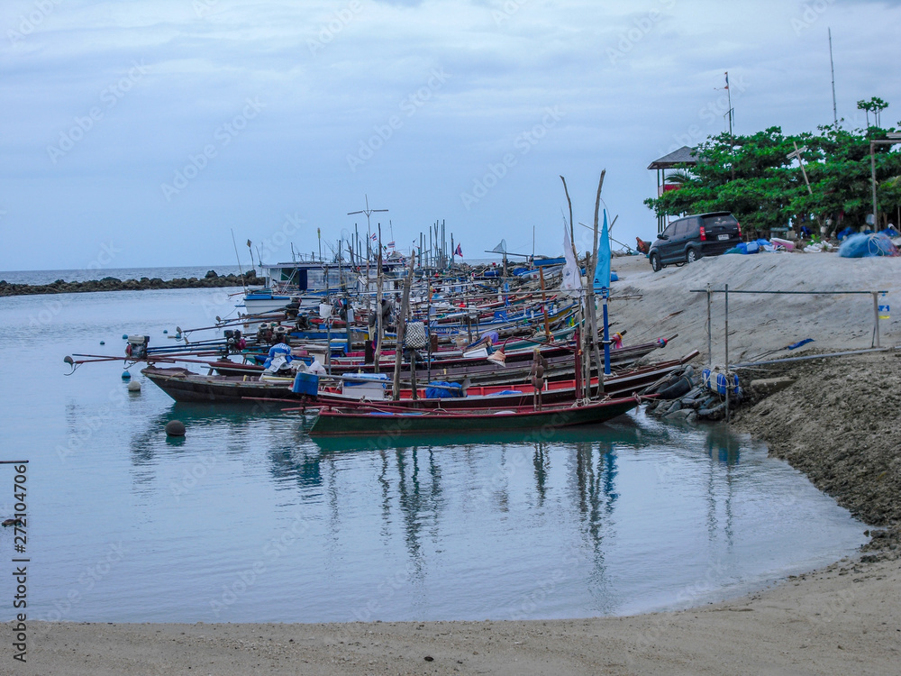 Traditional fishing wooden boats at the pier on Koh Samui. Thailand