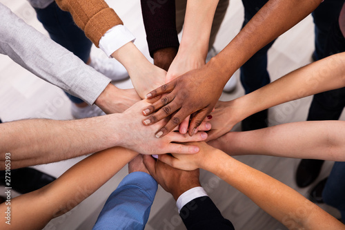 Diverse People Stacking Hand Together photo