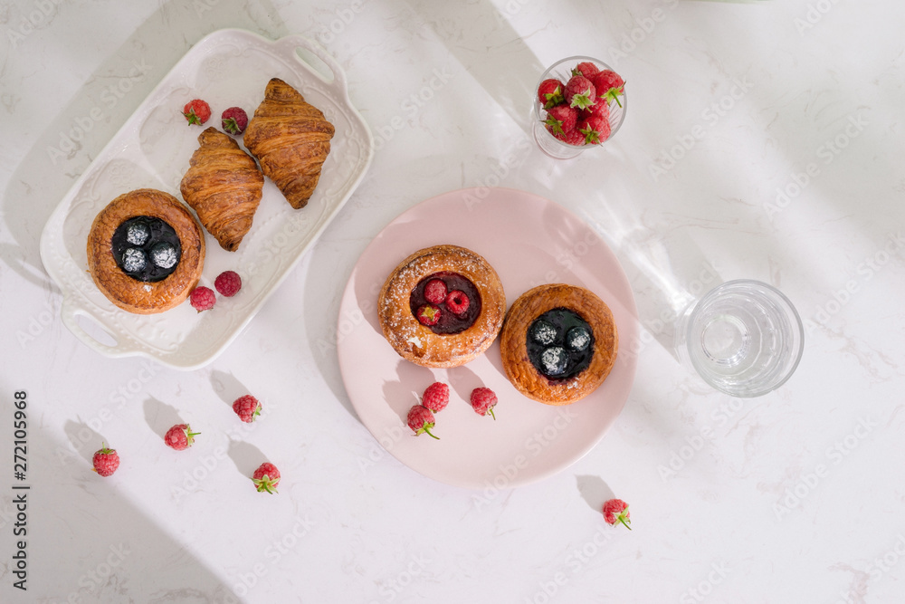 Romantic tropical breakfast Danish pastry, coffee, juice. Summer background Romantic tropical breakfast Danish pastry, coffee, juice. Summer background