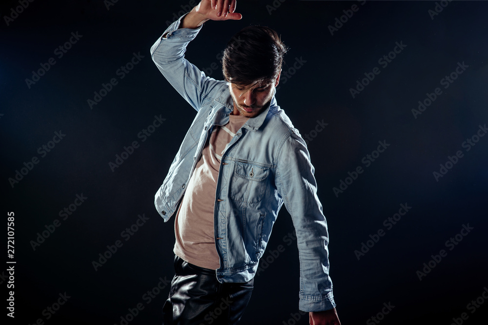 Young man model posing in the studio Young man model posing in the studio
