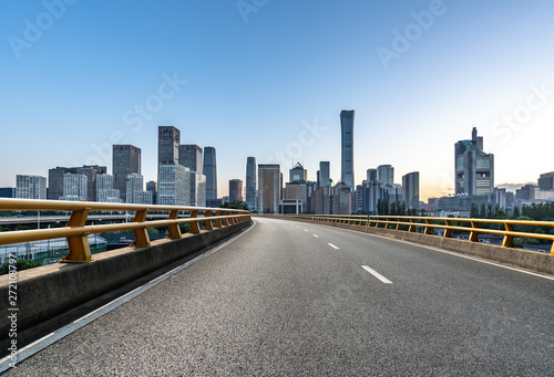 city skyline with empty road