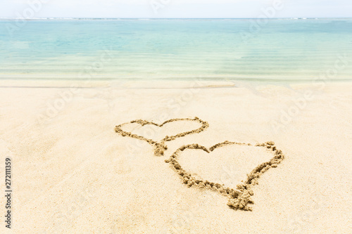 Heart Shape Drawn On Sand Near The Seashore
