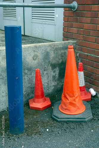 Abandoned Traffic Cones in Urban Back of Shops Setting