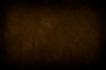 Brown background, dark slate texture.