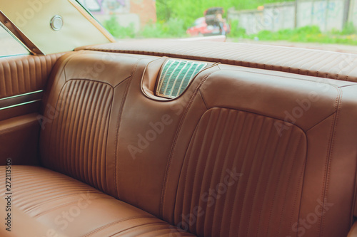 Old leather vintage car seat detail. interior of the old car.
