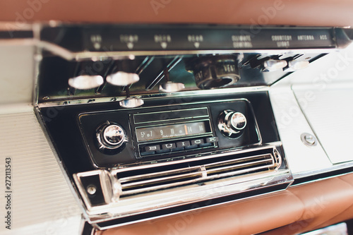 old car radio in vintage car retro.