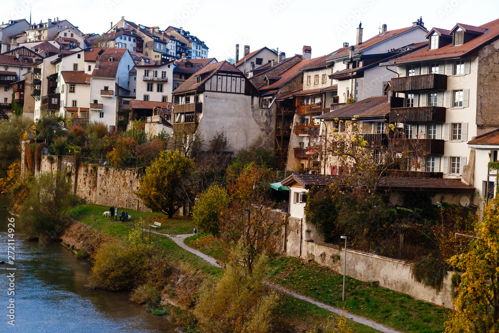 Fototapeta premium Landscape with historic medieval houses in Friburg, Switzerland