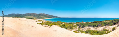 Panorama of the big dune of Valdevaqueros in Tarifa and Punta Paloma and Valdevaqueros beaches. Impressive nature landscape of the coast of Cadiz in Andalusia, Spain photo