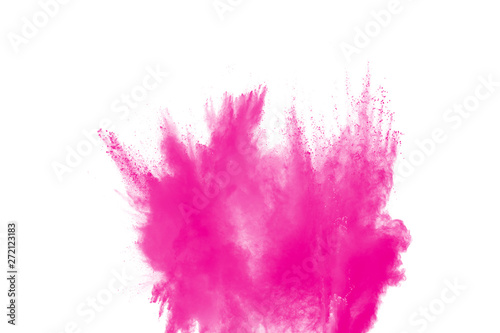 Pink powder explosion on white background.Pink dust particles splash.