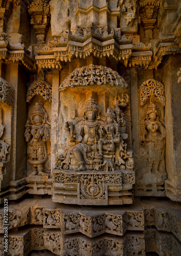 Carving Cut In Rock Of Lord Shiva And The Goddess Parvati At Keshava Temple, Somnathpur, India photo