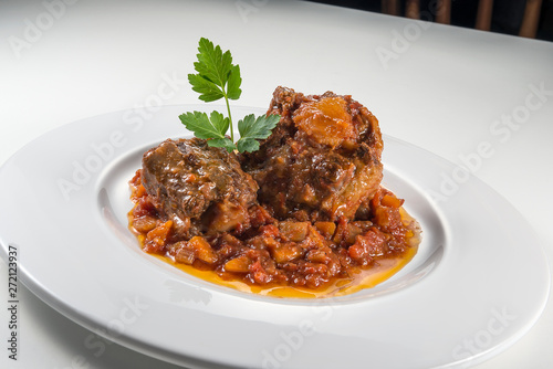 Dish with portion of oxtail stewed