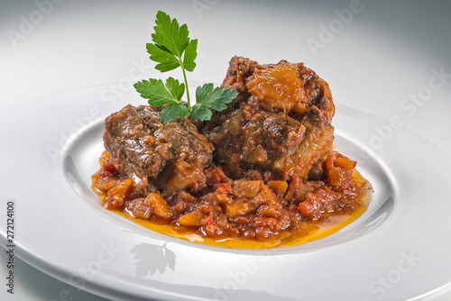 Dish with portion of oxtail stewed