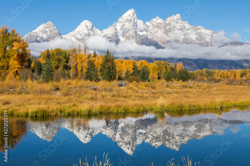 Scenic Reflection of the Teton Range in Autumn