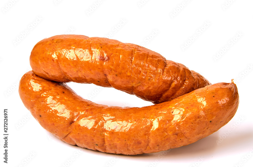 Meat sausages on a light background. The concept of traditional cuisine. Meat sausages on a light background. The concept of traditional cuisine.