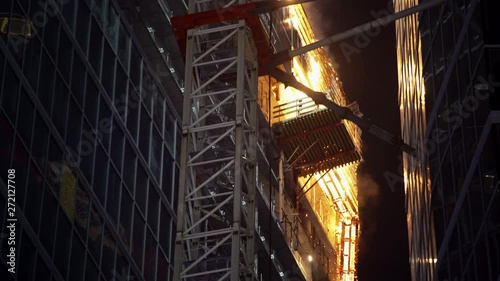 Wallpaper Mural Newly constructed building on blazing fire, Warsaw hub tower incident Torontodigital.ca