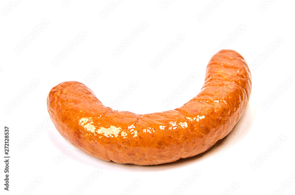 Grilled sausages with onions on a Board on a light background. Juicy sausage rings in a pile on a white background.