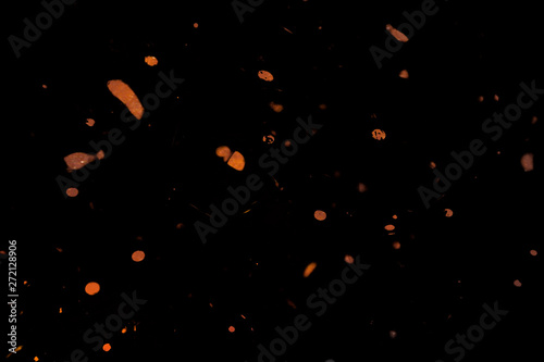 Beautiful abstract texture color orange yellow and gold grainy grunge on black pattern background and art wallpaper