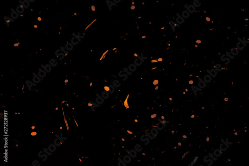 Beautiful abstract texture color orange yellow and gold grainy grunge on black pattern background and art wallpaper